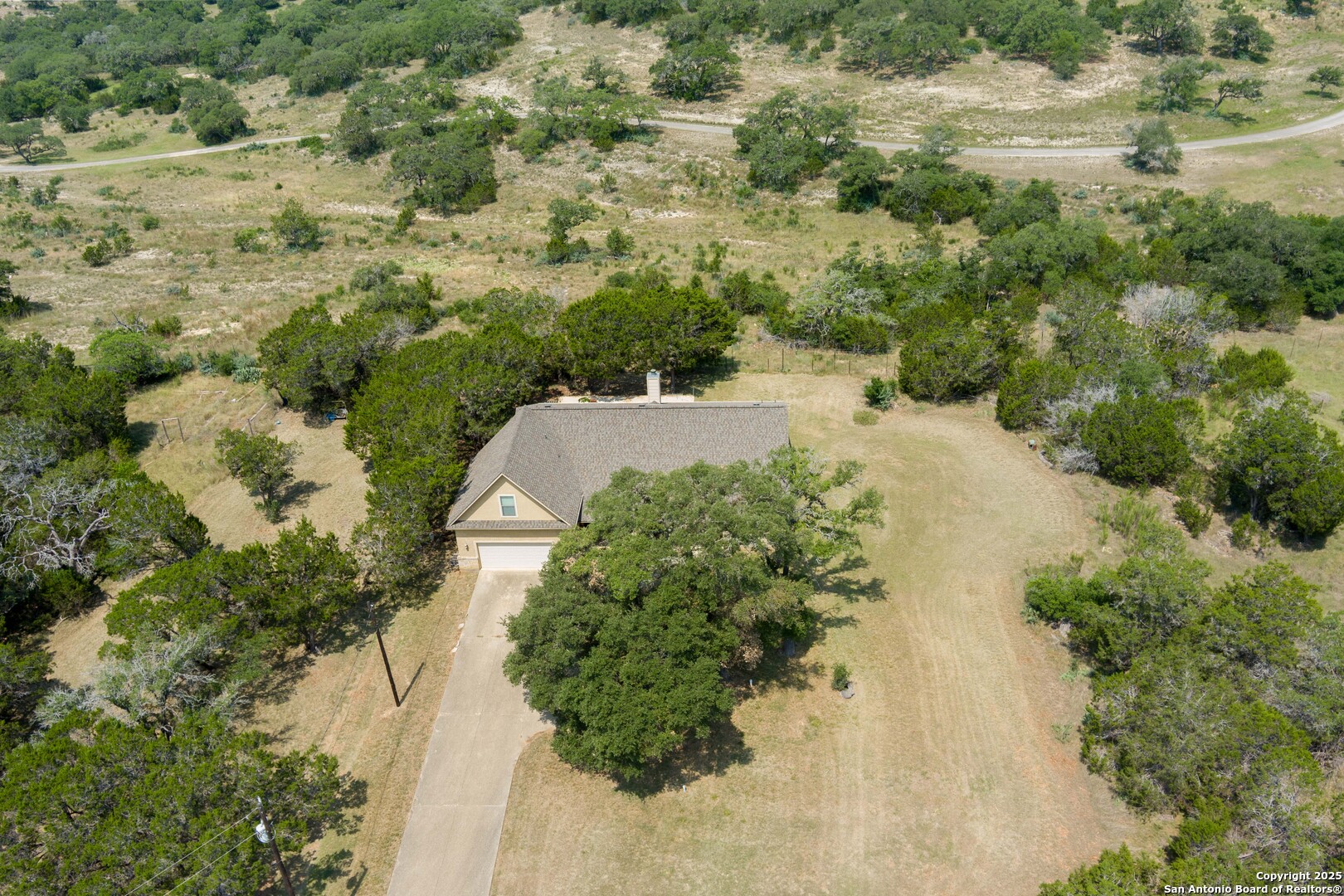 448 Western Bandera, TX 78003 - Photo 35 of 35 a view of a lake with a yard