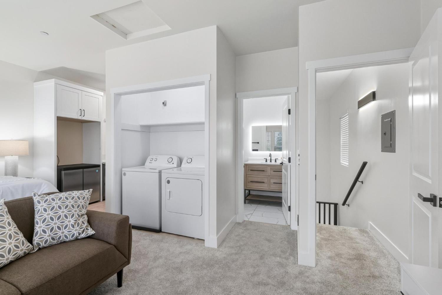 622 North Stockton Avenue Ripon, CA 95366 - Photo 25 of 34 a living room with furniture and a walk in closet