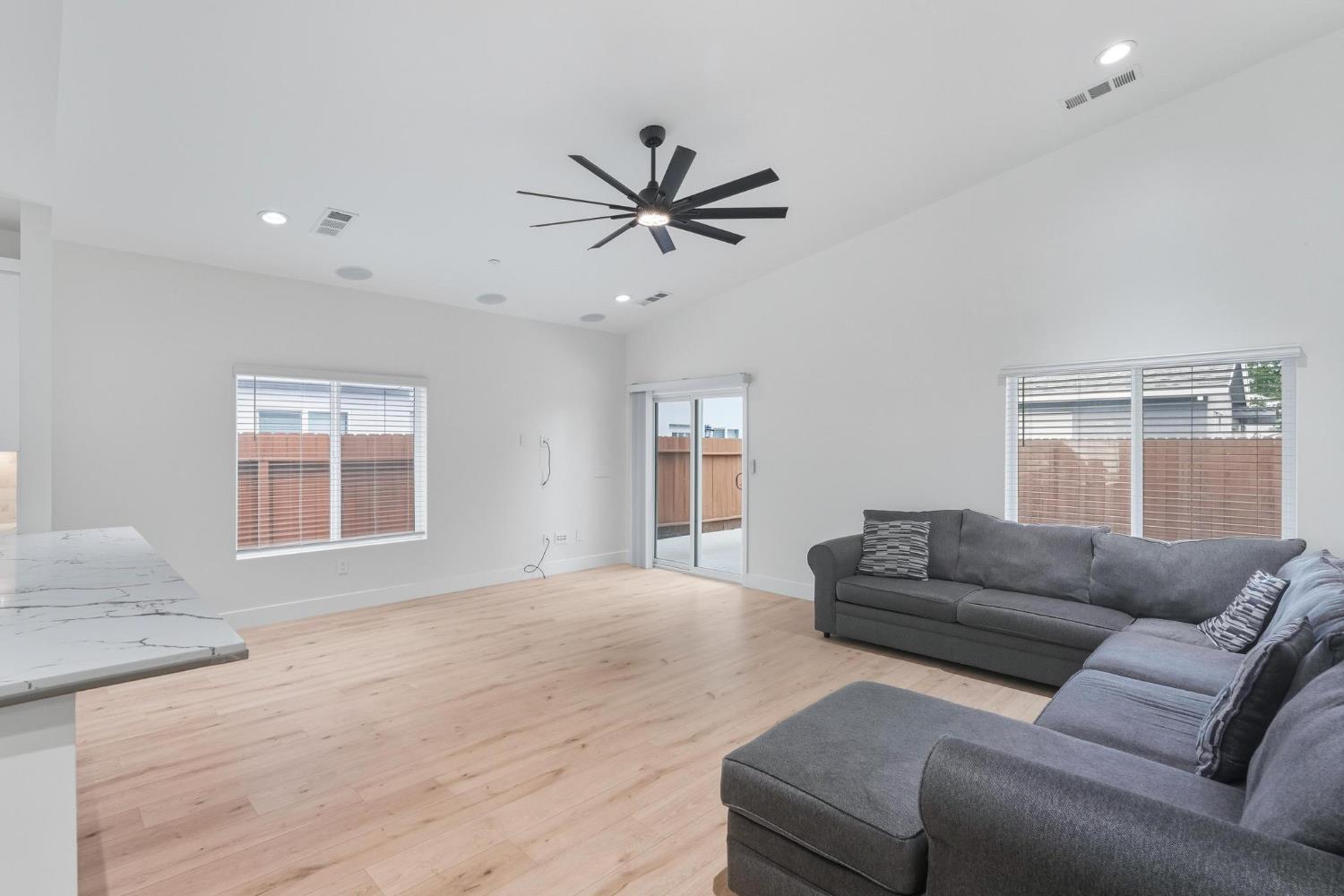622 North Stockton Avenue Ripon, CA 95366 - Photo 3 of 34 a living room with furniture and a window