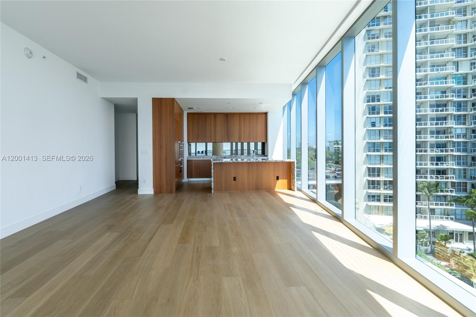 175 Southeast 25th Road, Unit 501 Miami, FL 33129 - Photo 16 of 67 a view of wooden floor and windows in a room