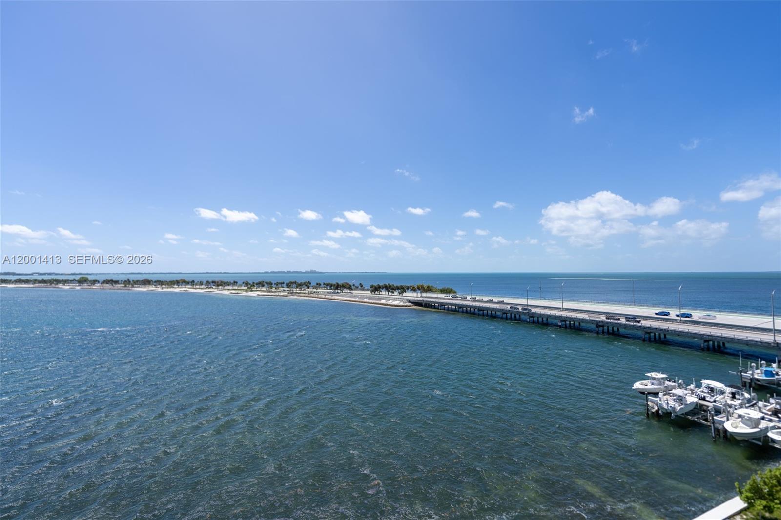 175 Southeast 25th Road, Unit 501 Miami, FL 33129 - Photo 2 of 67 a view of an ocean beach and kitchen