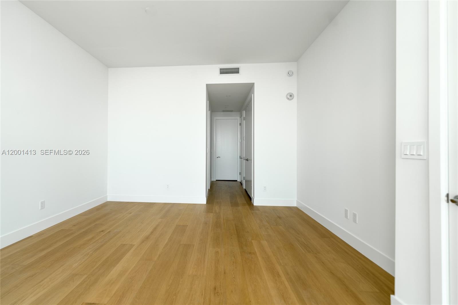 175 Southeast 25th Road, Unit 501 Miami, FL 33129 - Photo 23 of 67 a view of empty room with wooden floor
