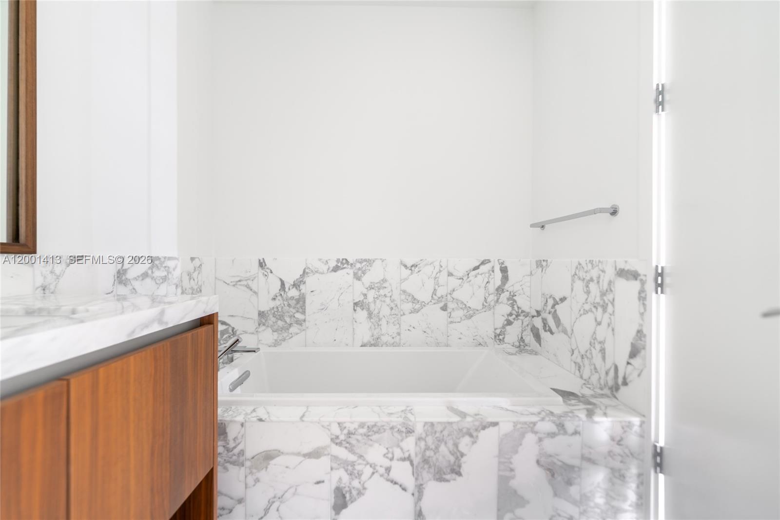 175 Southeast 25th Road, Unit 501 Miami, FL 33129 - Photo 27 of 67 a bathroom with a bathtub and shower