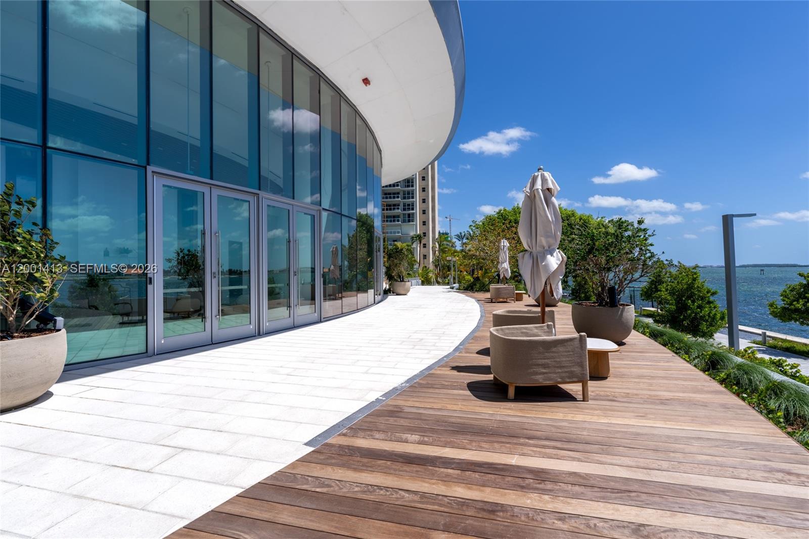 175 Southeast 25th Road, Unit 501 Miami, FL 33129 - Photo 47 of 67 a view of a patio with couches and potted plants
