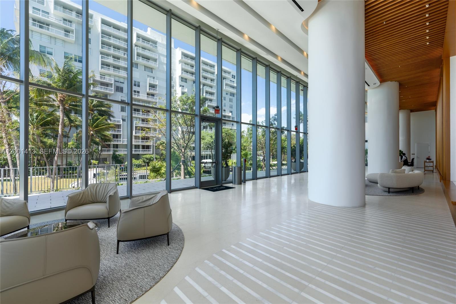 175 Southeast 25th Road, Unit 501 Miami, FL 33129 - Photo 58 of 67 a living room with furniture and a large window