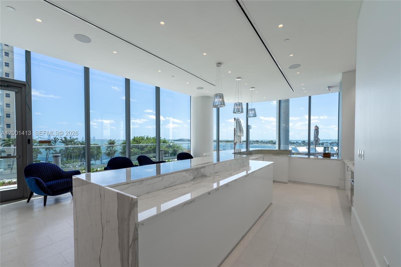 175 Southeast 25th Road, Unit 501 Miami, FL 33129 - Photo 60 of 67 a large living room with large windows and furniture