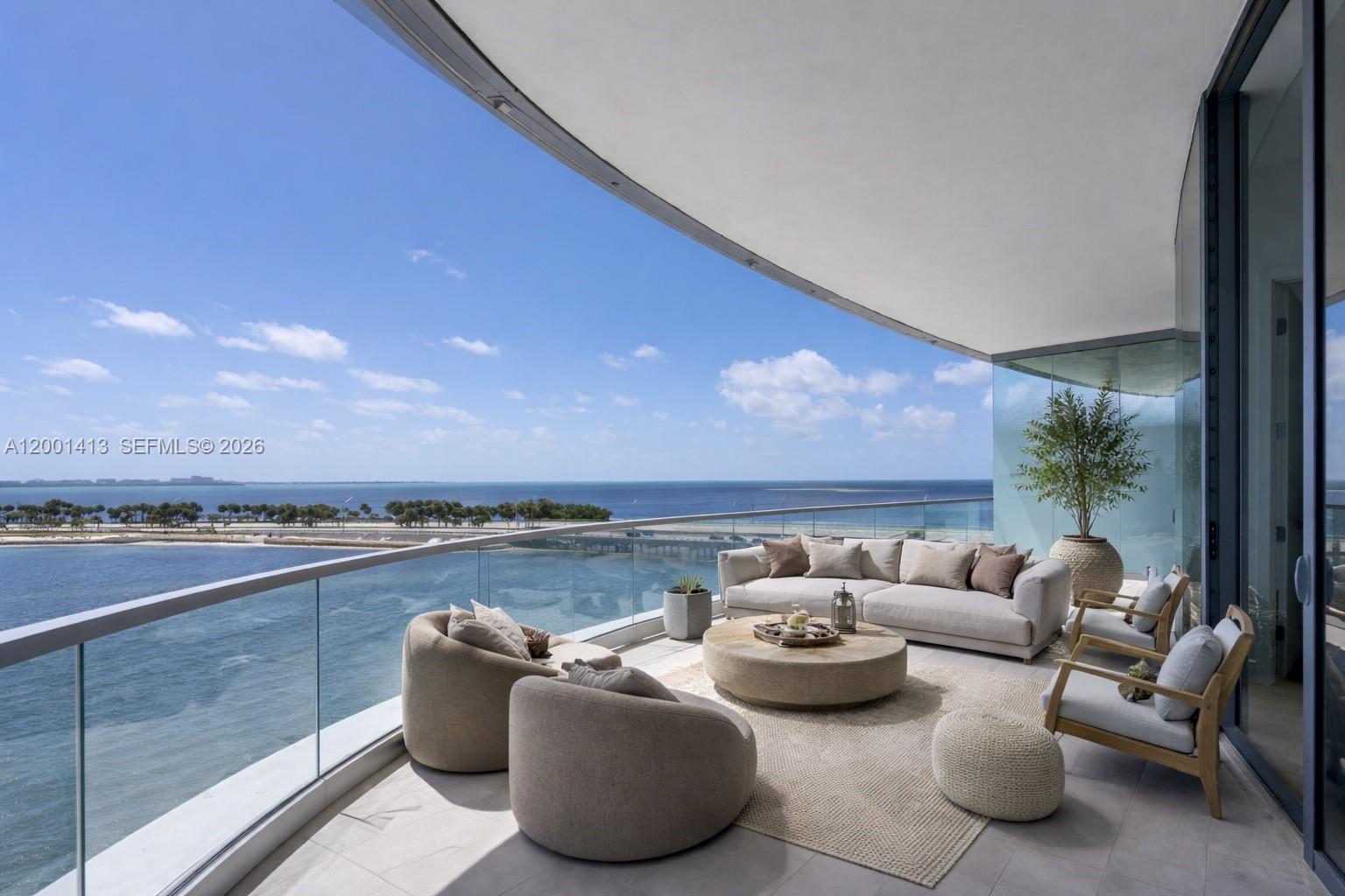 175 Southeast 25th Road, Unit 501 Miami, FL 33129 - Photo 7 of 67 a view of a patio with couches and potted plants