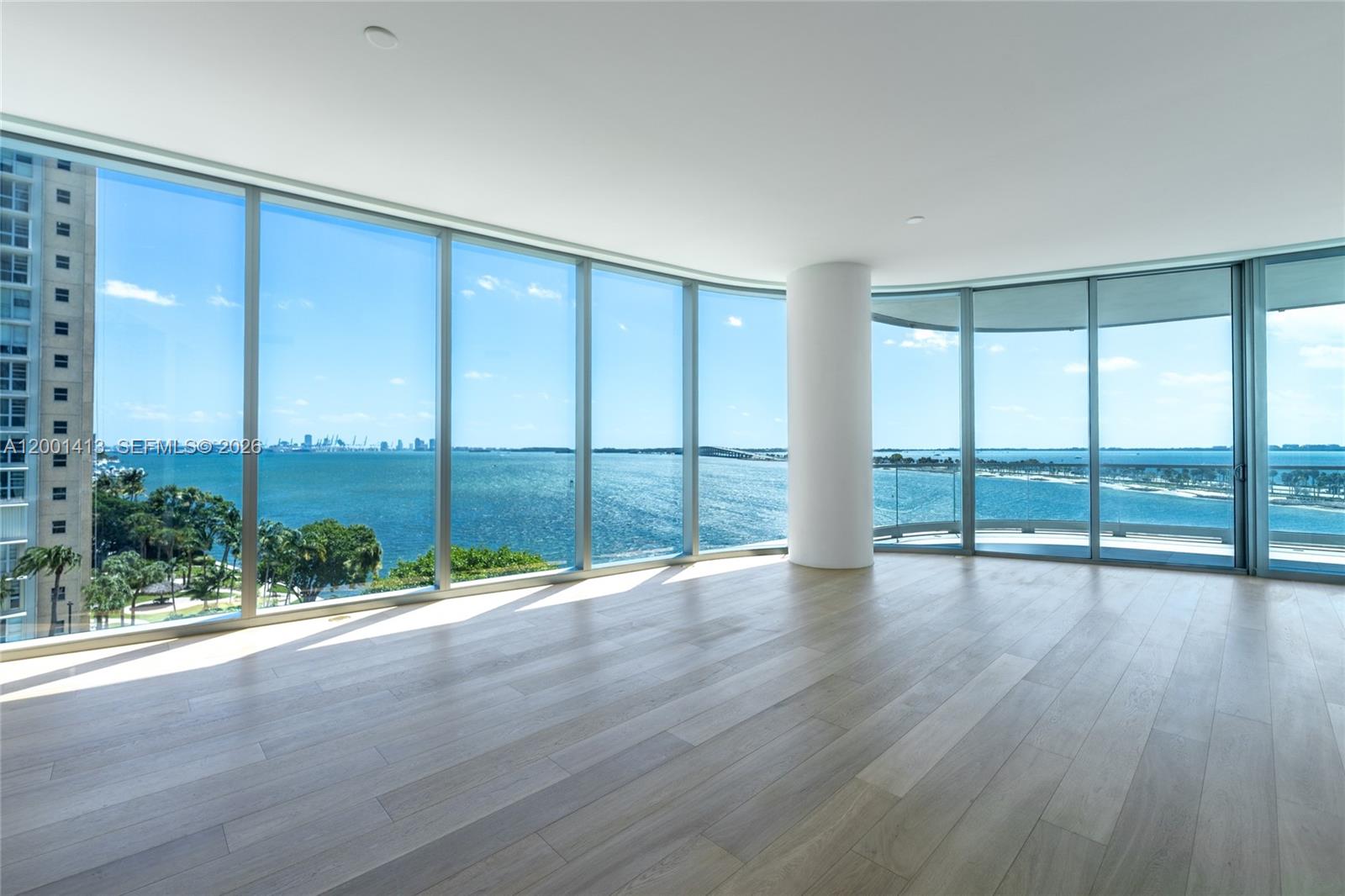 175 Southeast 25th Road, Unit 501 Miami, FL 33129 - Photo 10 of 67 an empty room with wooden floor and windows