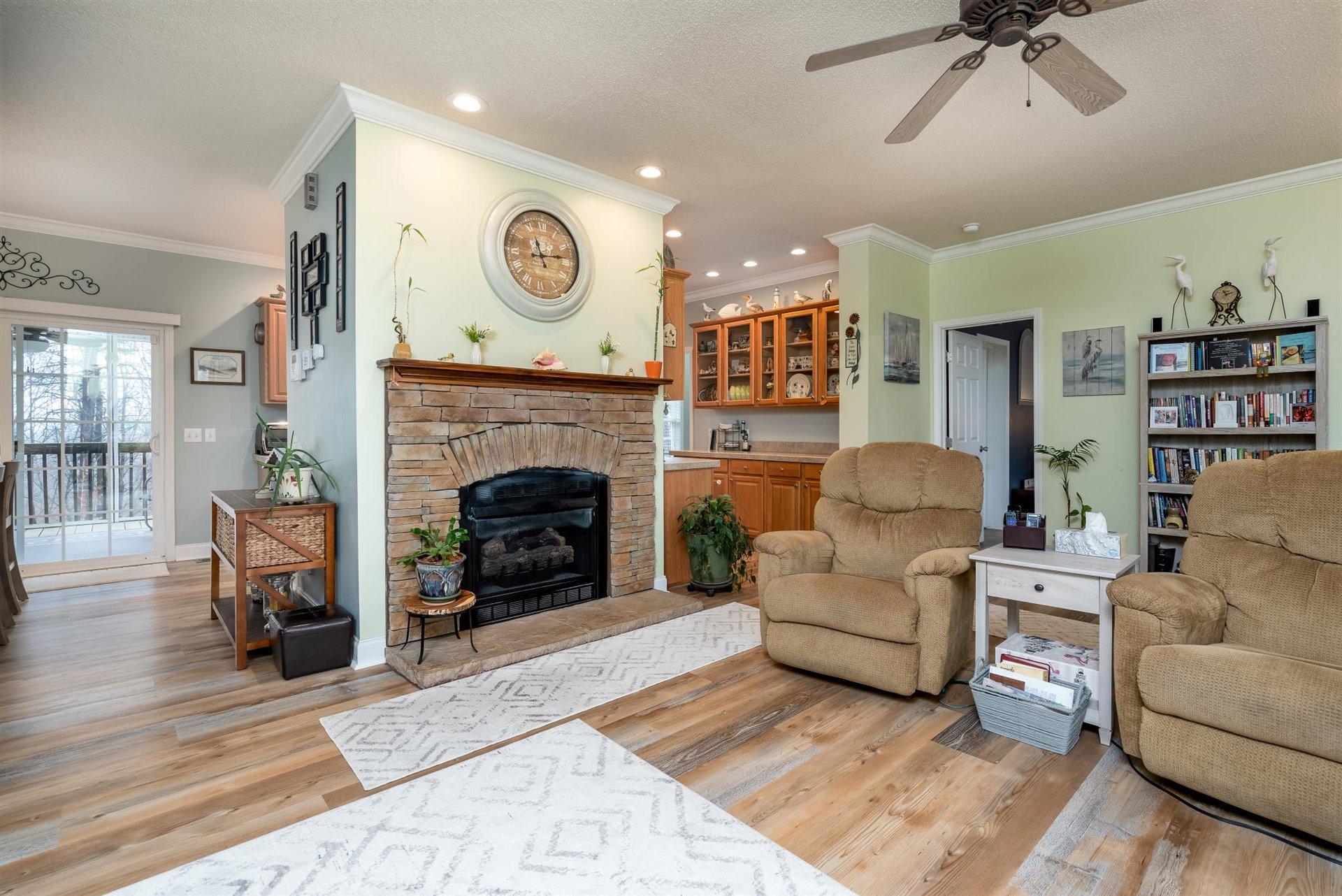 281 Sunny Field Road Wirtz, VA 24184 - Photo 11 of 44 a living room with furniture and a fireplace