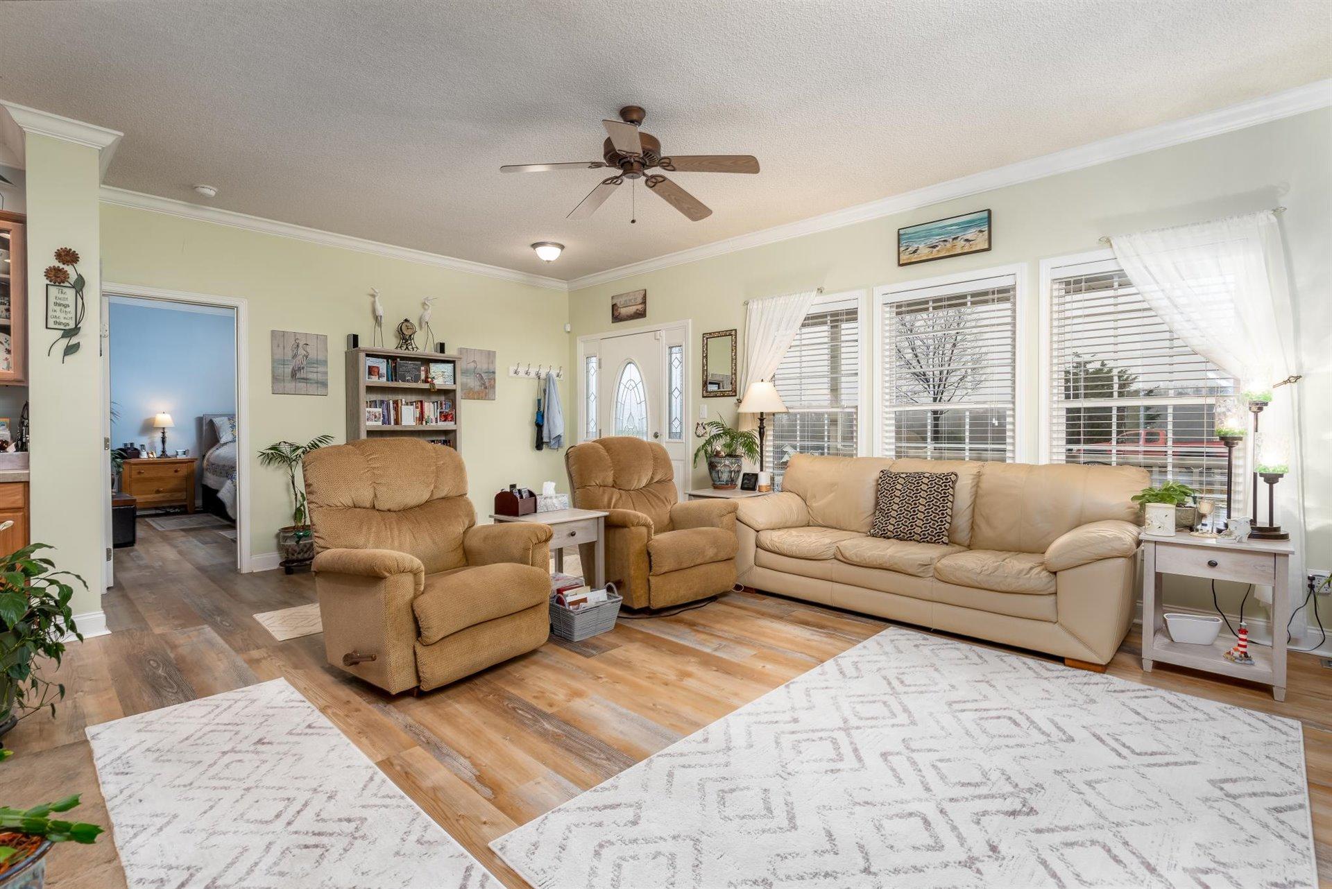 281 Sunny Field Road Wirtz, VA 24184 - Photo 12 of 44 a living room with furniture and a large window