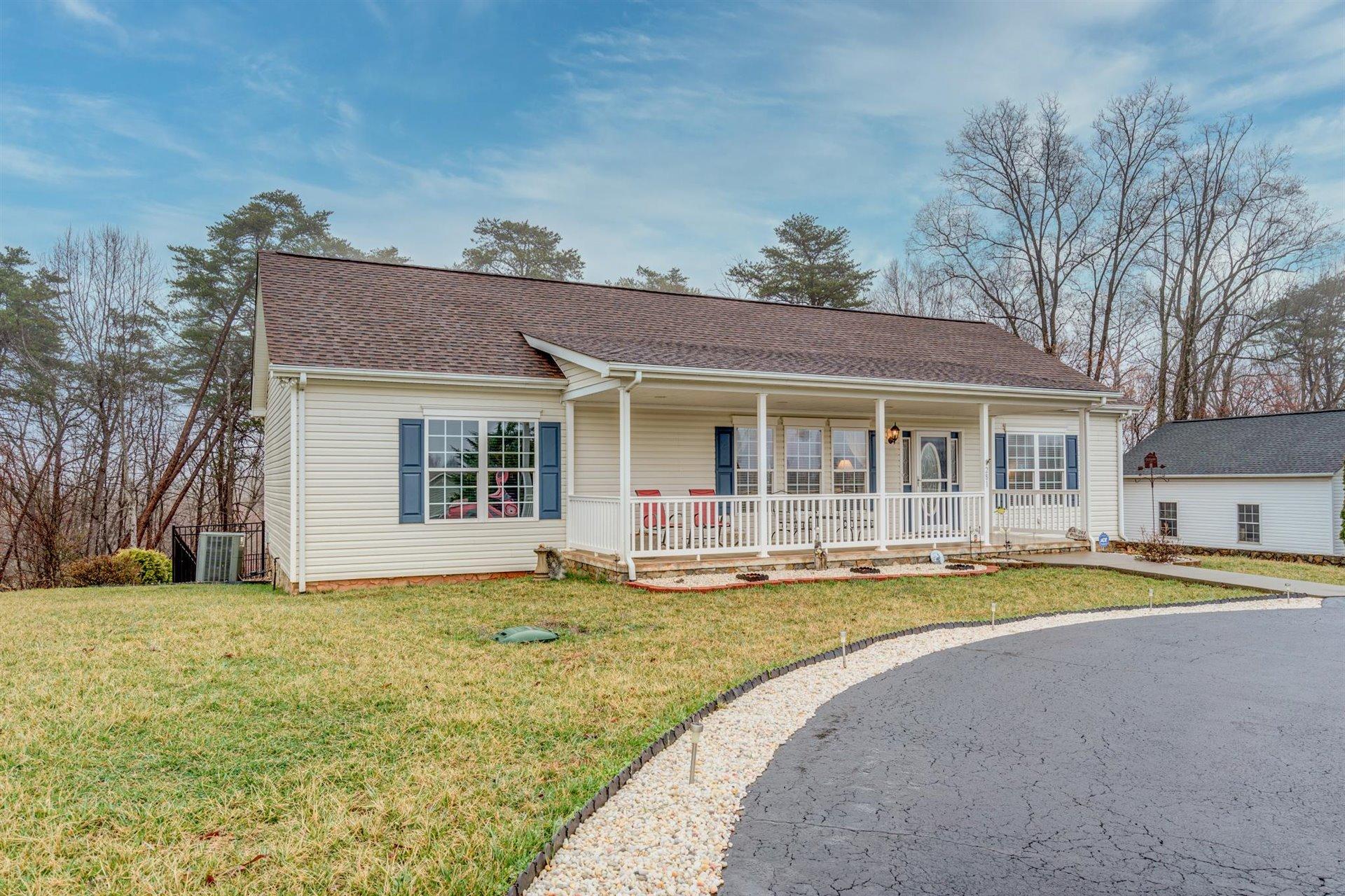 281 Sunny Field Road Wirtz, VA 24184 - Photo 3 of 44 a view of a house with a swimming pool and a yard