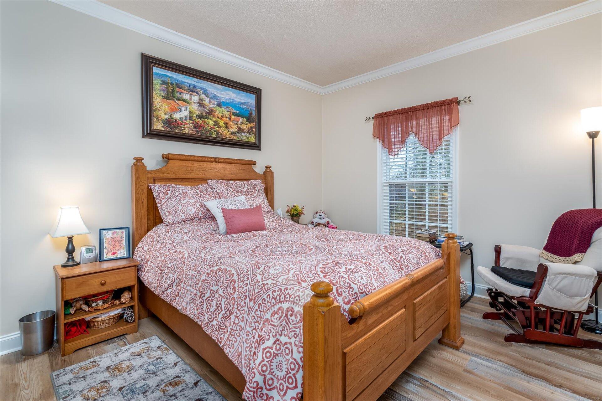 281 Sunny Field Road Wirtz, VA 24184 - Photo 22 of 44 a bed room with a bed and a window