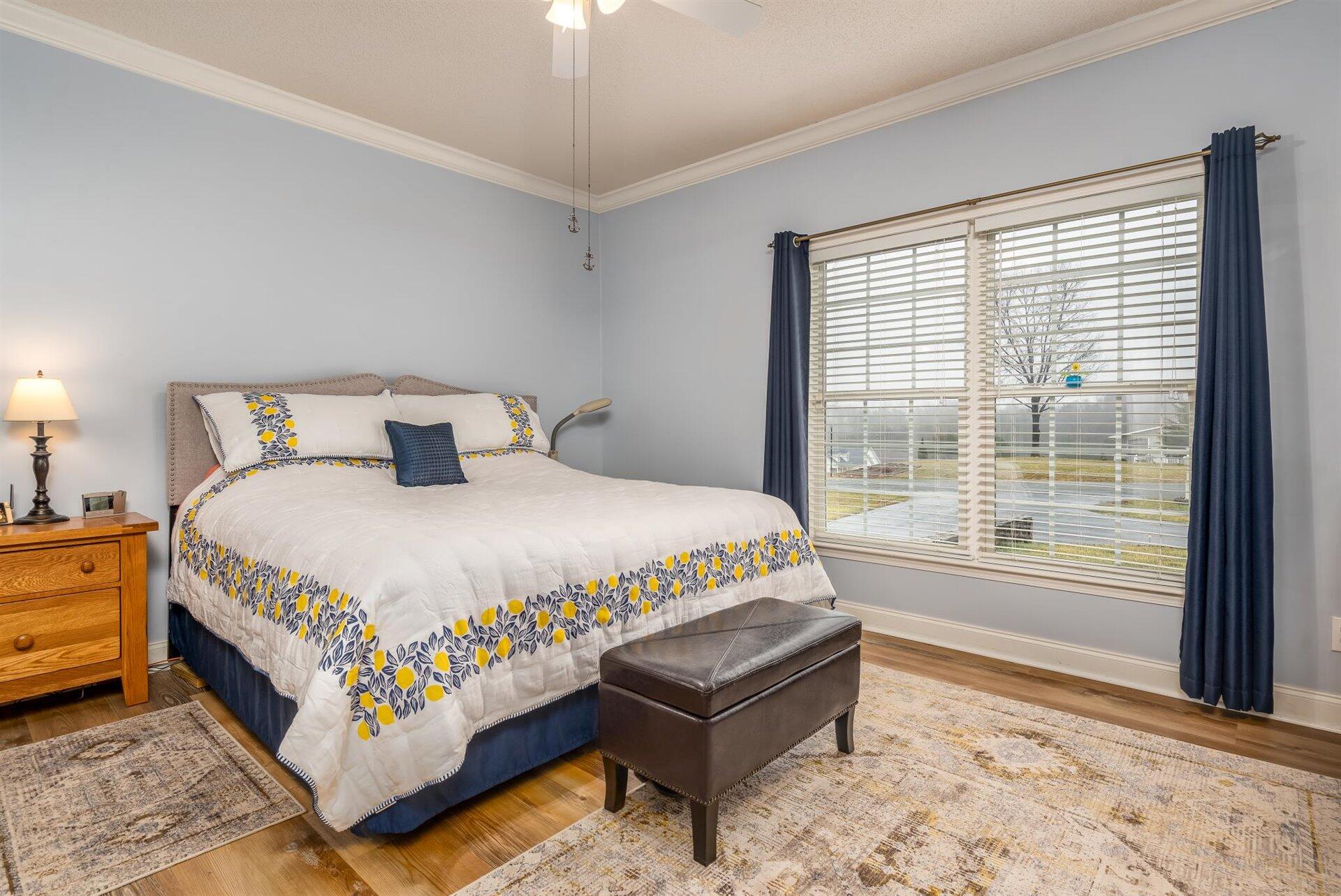 281 Sunny Field Road Wirtz, VA 24184 - Photo 23 of 44 a large bed sitting in a bedroom next to a window
