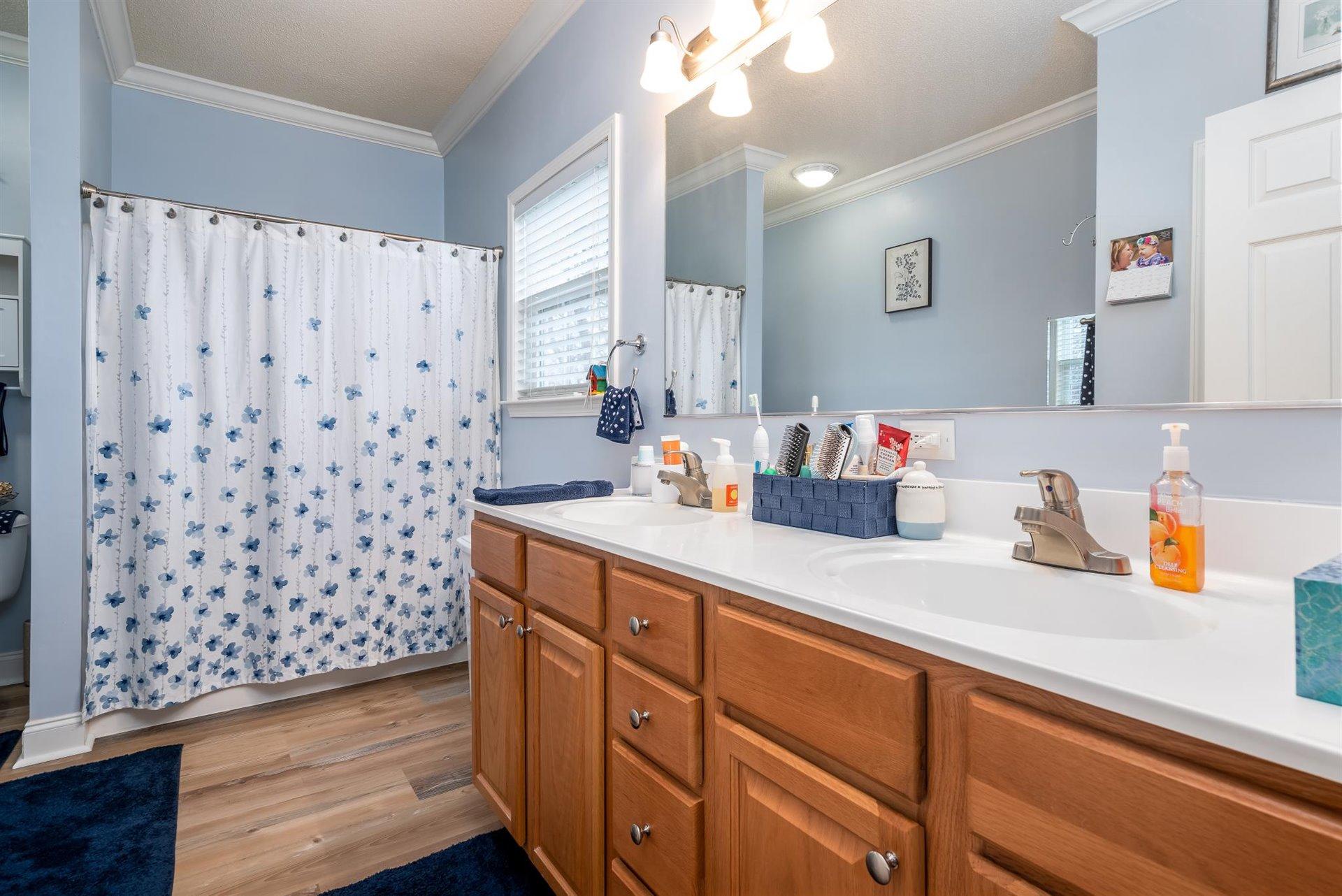 281 Sunny Field Road Wirtz, VA 24184 - Photo 25 of 44 a kitchen with a sink and cabinets