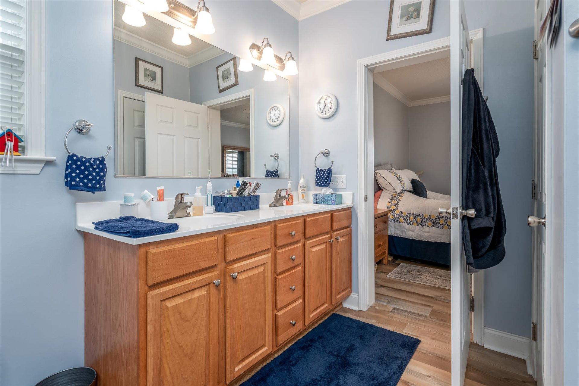 281 Sunny Field Road Wirtz, VA 24184 - Photo 26 of 44 a bathroom with a sink and a mirror