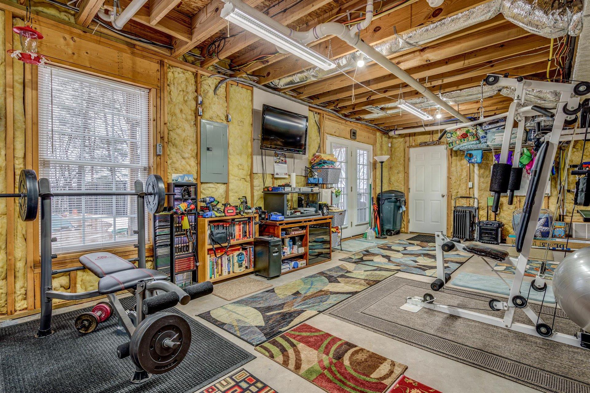 281 Sunny Field Road Wirtz, VA 24184 - Photo 28 of 44 a view of a room with gym equipment