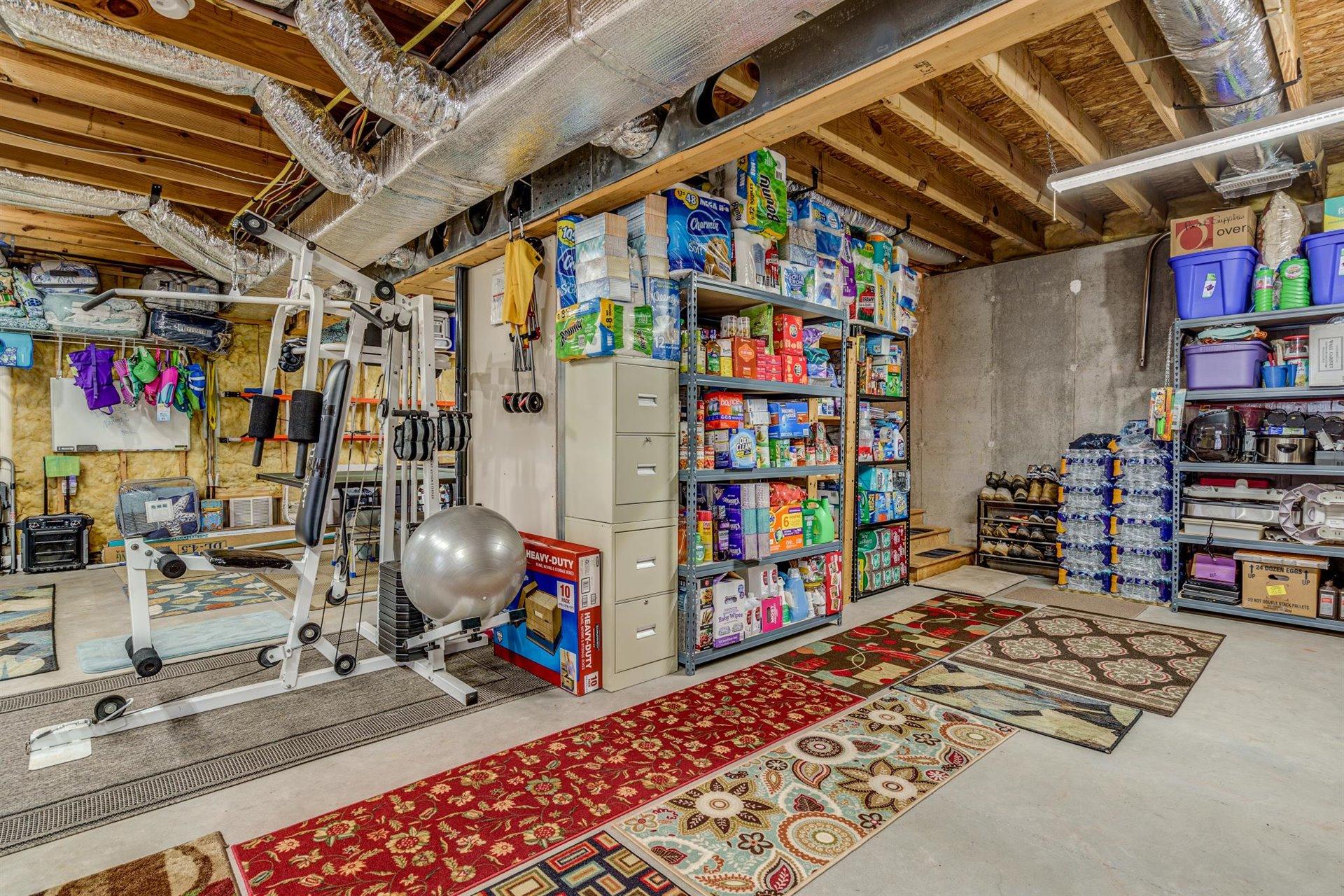 281 Sunny Field Road Wirtz, VA 24184 - Photo 29 of 44 a storage room with lots of furniture and clutter