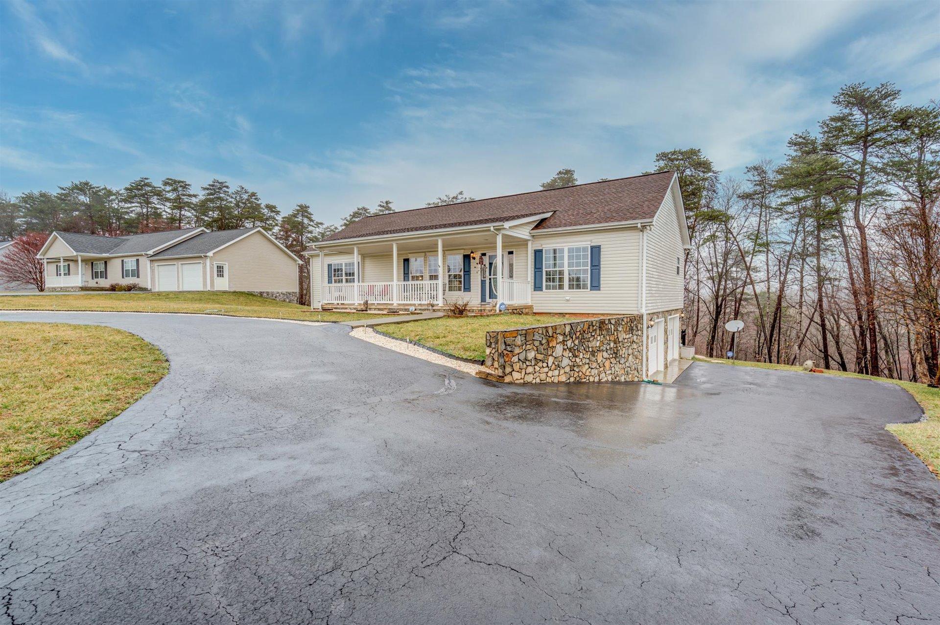 281 Sunny Field Road Wirtz, VA 24184 - Photo 4 of 44 front view of a house with a yard