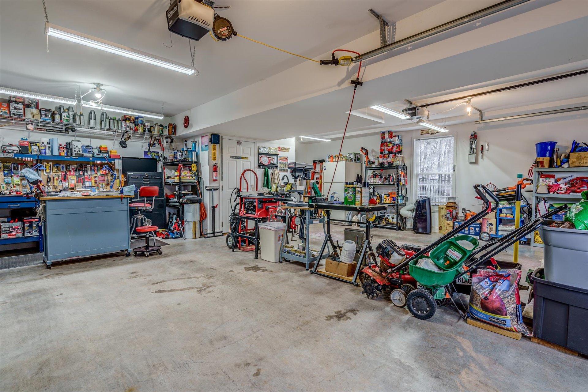 281 Sunny Field Road Wirtz, VA 24184 - Photo 33 of 44 a view of a storage with a lot of stuff