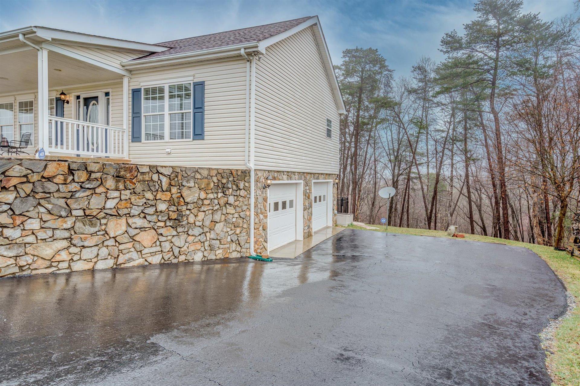 281 Sunny Field Road Wirtz, VA 24184 - Photo 34 of 44 a view of a house with a yard
