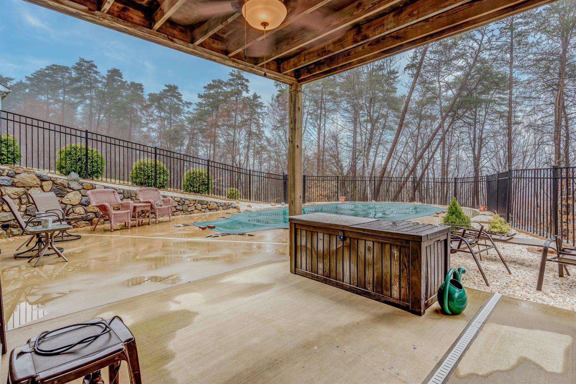 281 Sunny Field Road Wirtz, VA 24184 - Photo 35 of 44 a backyard of a house with table and chairs