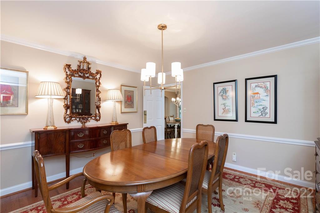 2096 Malvern Road Rock Hill, SC 29732 - Photo 13 of 41 a view of a dining room with furniture and chandelier
