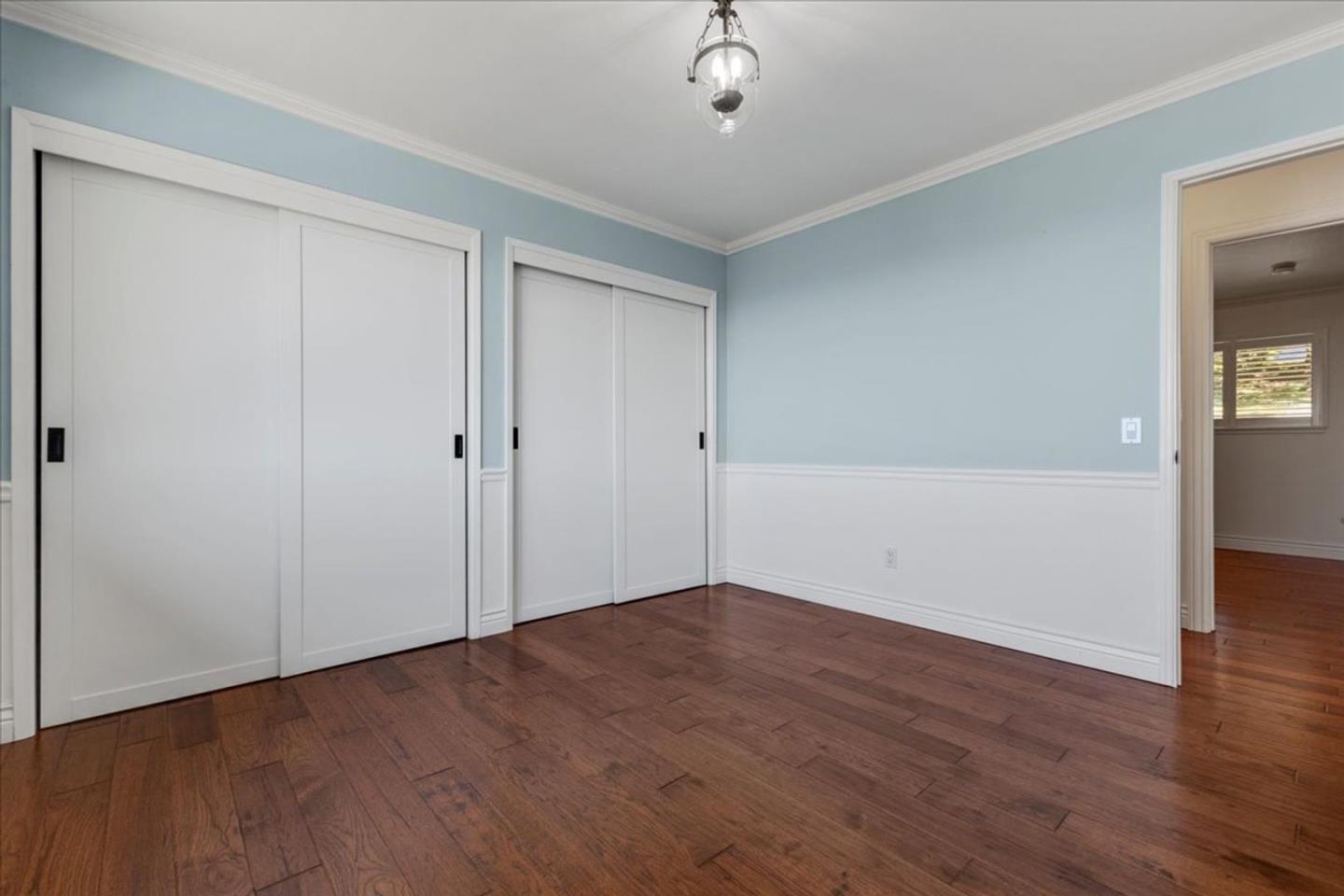 15 Mentone Road Carmel, CA 93923 - Photo 19 of 47 a view of an empty room with wooden floor