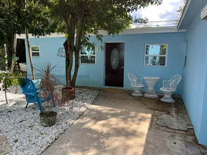 a room with bed and flat screen tv