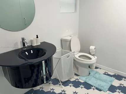 a kitchen with a refrigerator stove and microwave