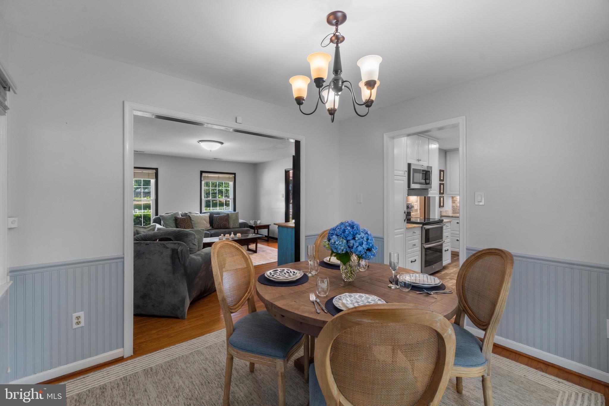 117 Oakwood Road Edgewater, MD 21037 - Photo 11 of 52 Dining area featuring a wood-finish round table an