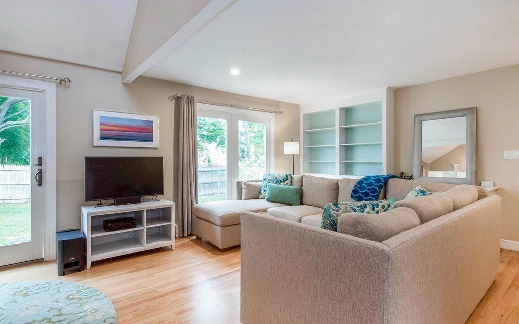 339 First Parish Road Scituate, MA 02066 - Photo 7 of 30 a living room with furniture and a flat screen tv