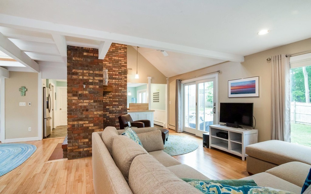 339 First Parish Road Scituate, MA 02066 - Photo 8 of 30 a living room with furniture and a flat screen tv