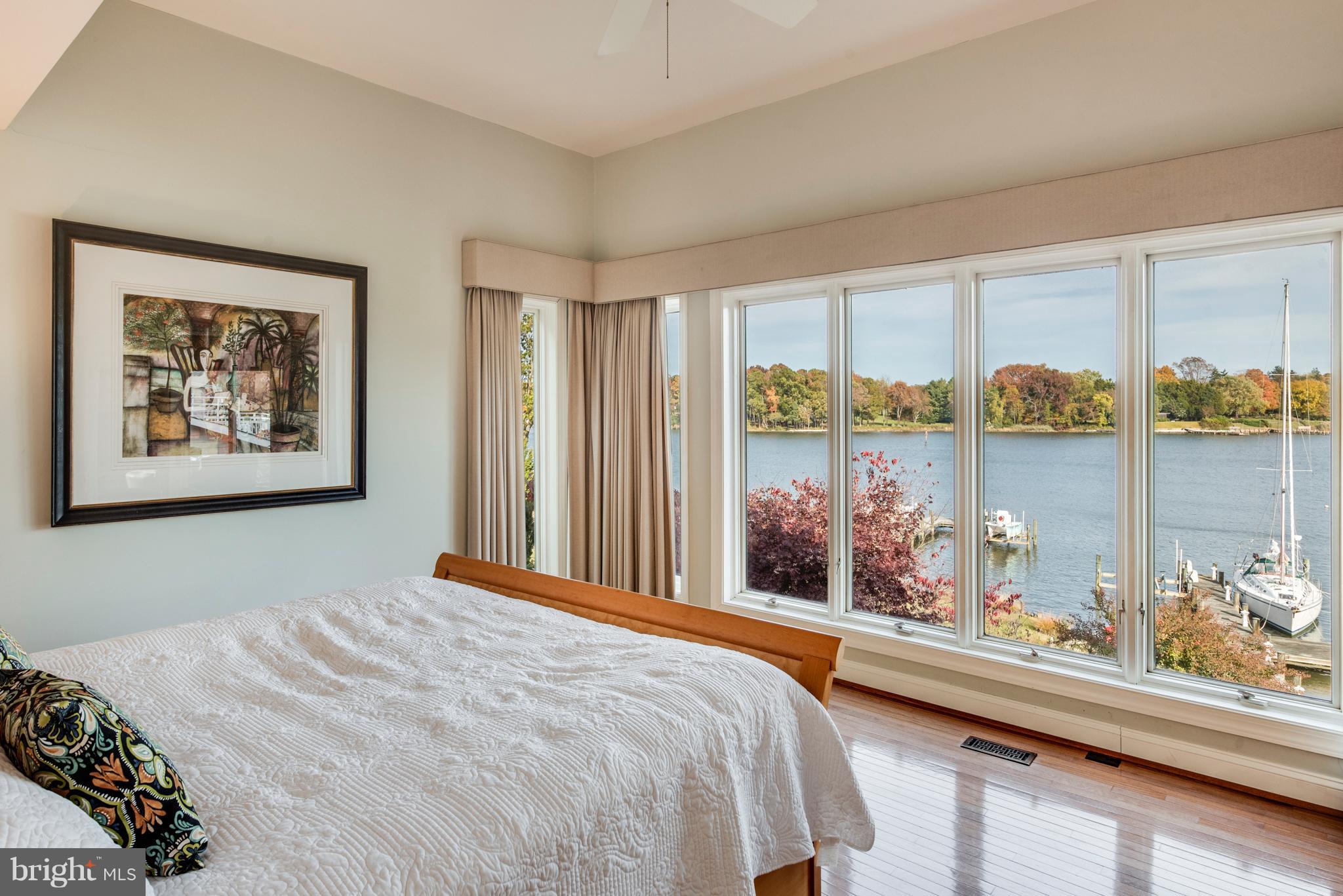 1795 Beachfield Road Annapolis, MD 21409 - Photo 35 of 49 a bedroom with a large bed and a window
