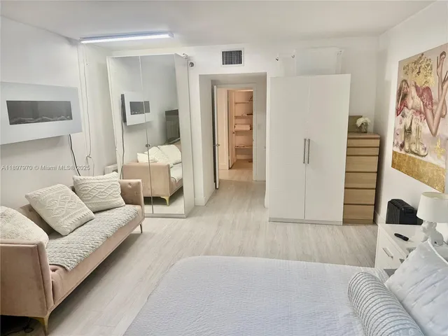 a living room with furniture and a couch