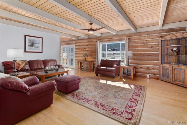 a outdoor living space with furniture and a potted plant