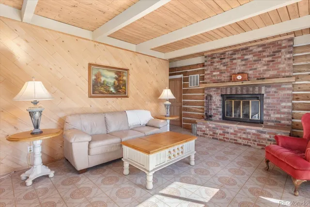 a view of a dining room with furniture wooden floor and a chandelier