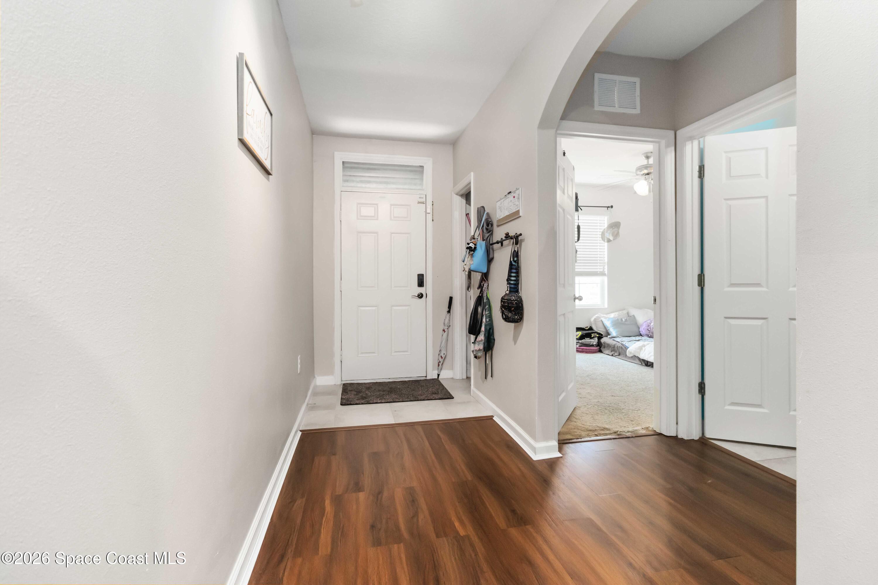 1070 Swiss Pointe Lane Rockledge, FL 32955 - Photo 2 of 24 wooden floor in a livingroom