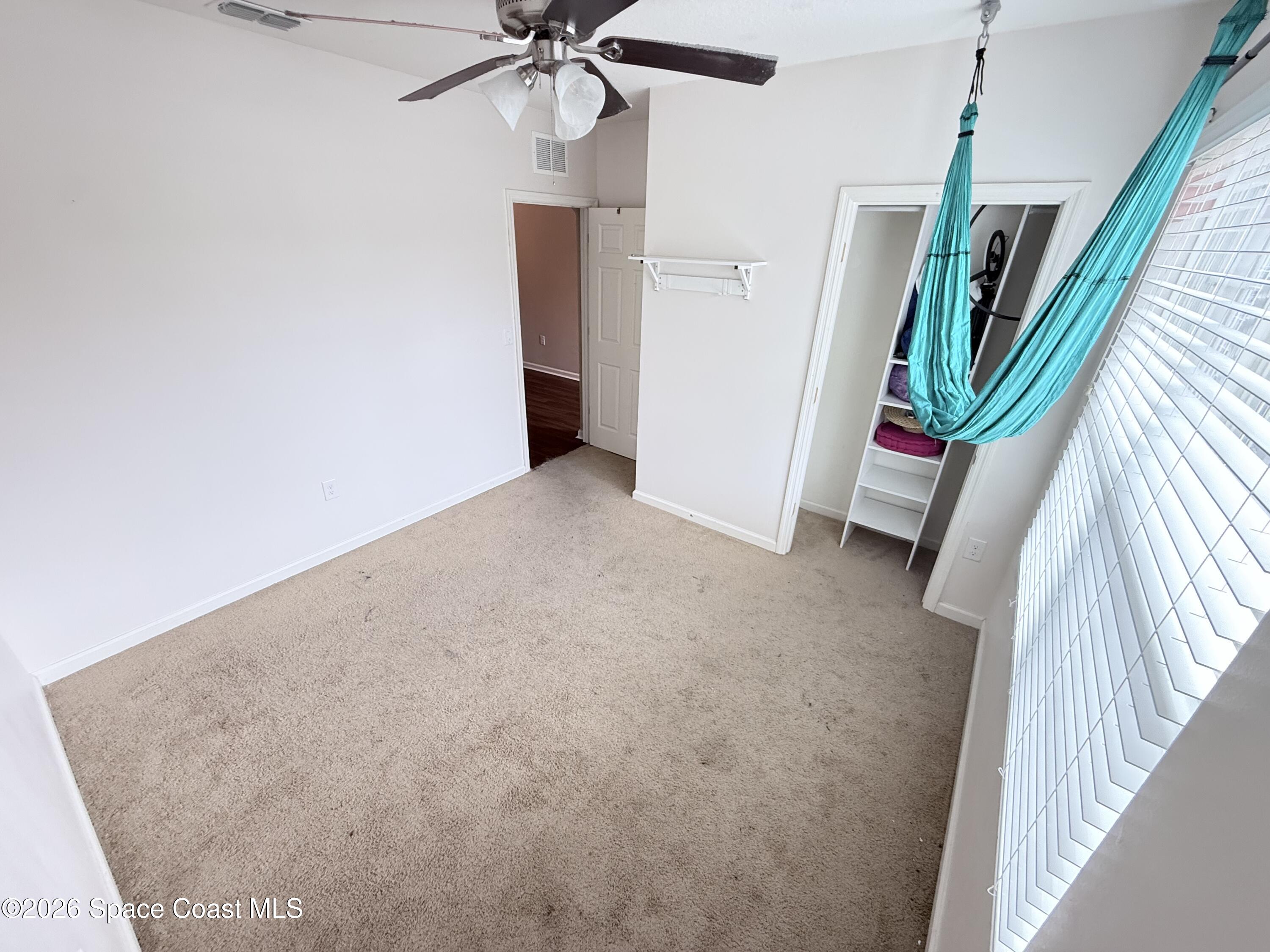 1070 Swiss Pointe Lane Rockledge, FL 32955 - Photo 3 of 24 a view of an empty room with a window