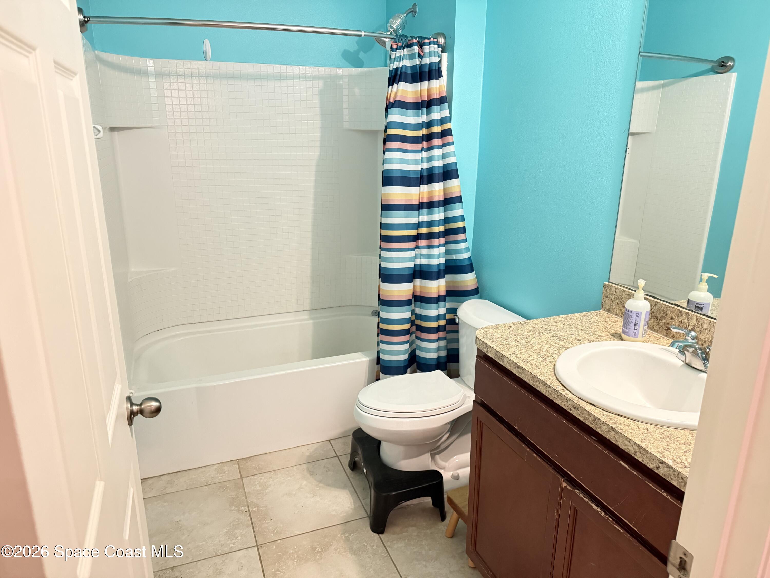 1070 Swiss Pointe Lane Rockledge, FL 32955 - Photo 5 of 24 a bathroom with a sink toilet and shower