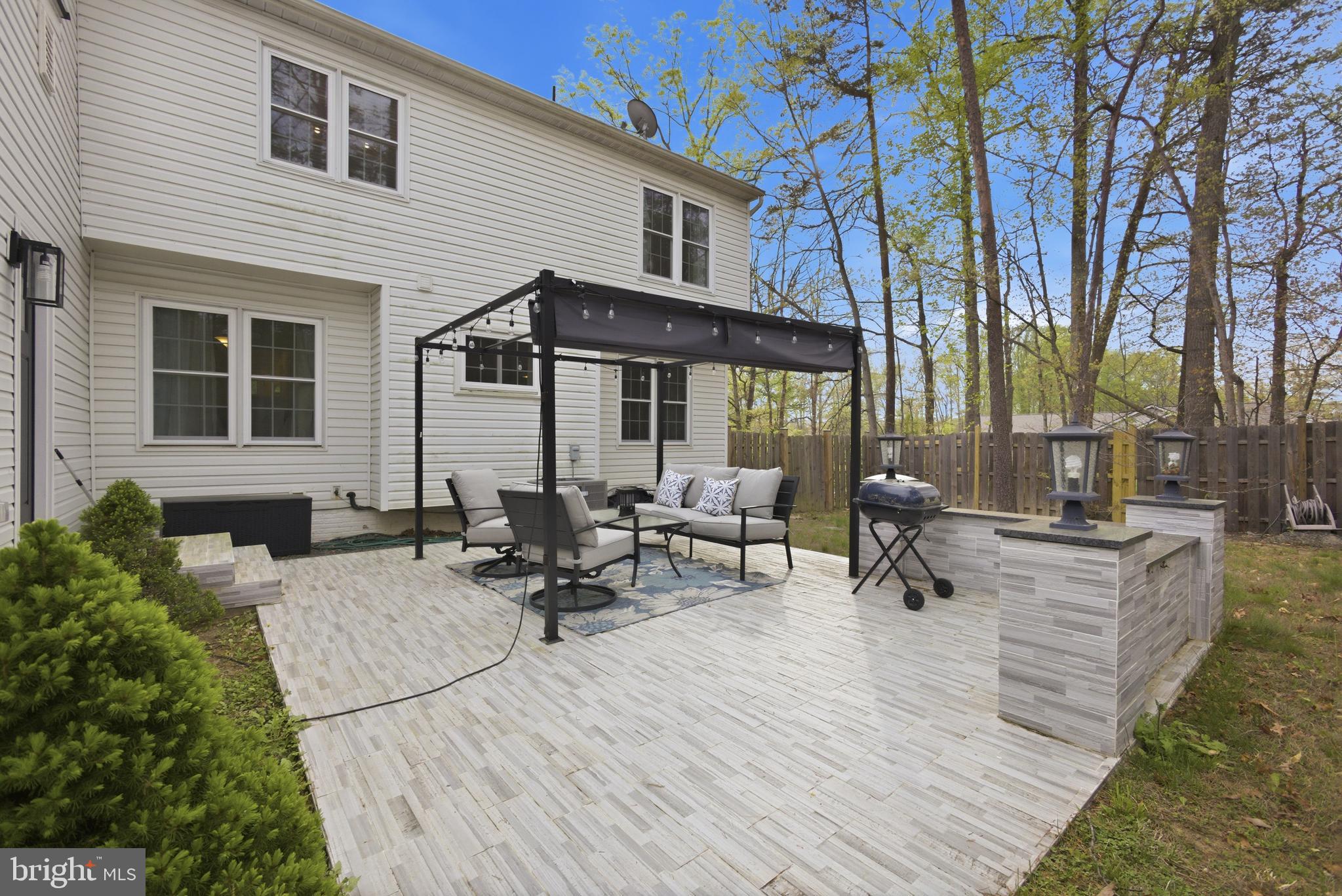 8664 Pohick Forest Court Springfield, VA 22153 - Photo 38 of 41 a view of a outdoor space with a patio