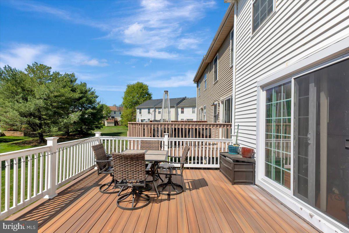 10983 Baskerville Road Reisterstown, MD 21136 - Photo 14 of 21 a view of a chair and tables in the balcony