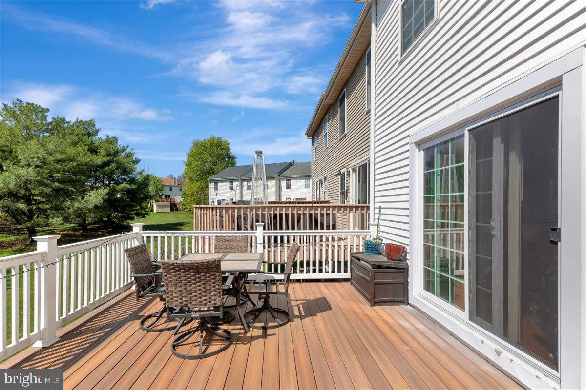 10983 Baskerville Road Reisterstown, MD 21136 - Photo 15 of 21 a view of a house with wooden deck