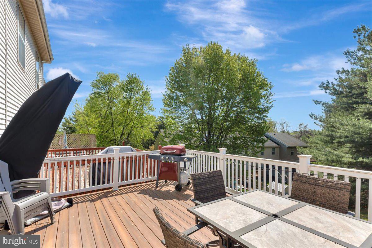 10983 Baskerville Road Reisterstown, MD 21136 - Photo 16 of 21 a view of a wooden deck