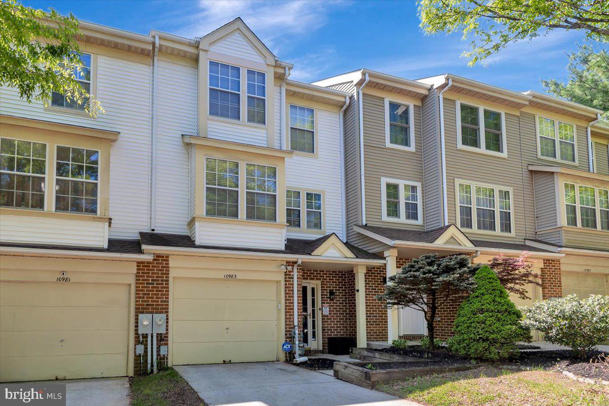 10983 Baskerville Road Reisterstown, MD 21136 - Photo 20 of 21 a front view of a house with a yard
