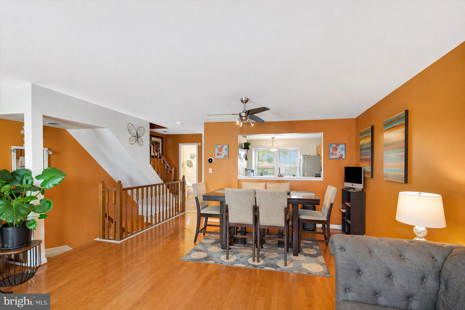 10983 Baskerville Road Reisterstown, MD 21136 - Photo 6 of 21 a dining room with furniture potted plants and wooden floor