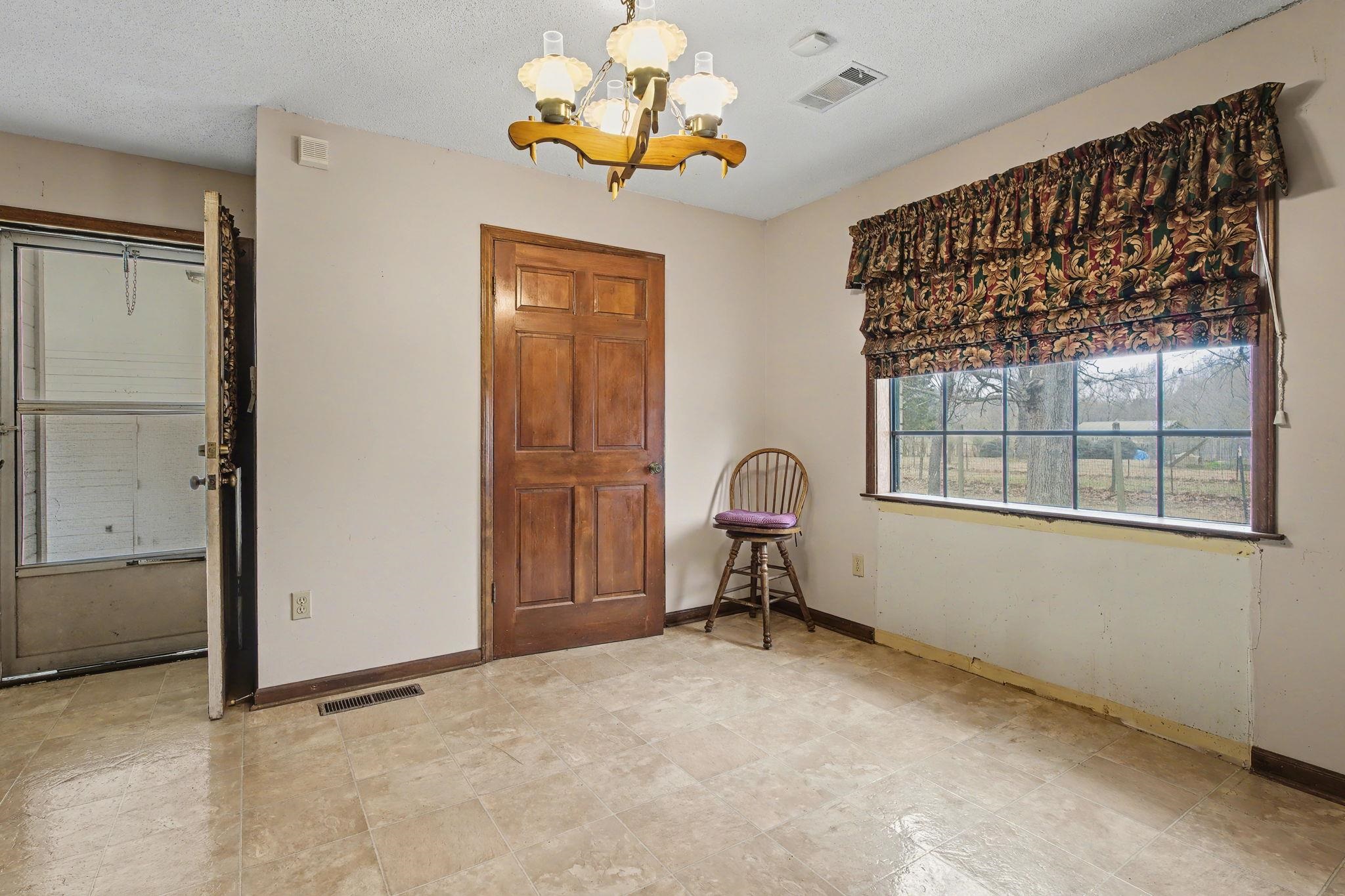 7439 Lexie Gardner Road Bartlett, TN 38002 - Photo 11 of 40 a view of a livingroom with a window and furniture