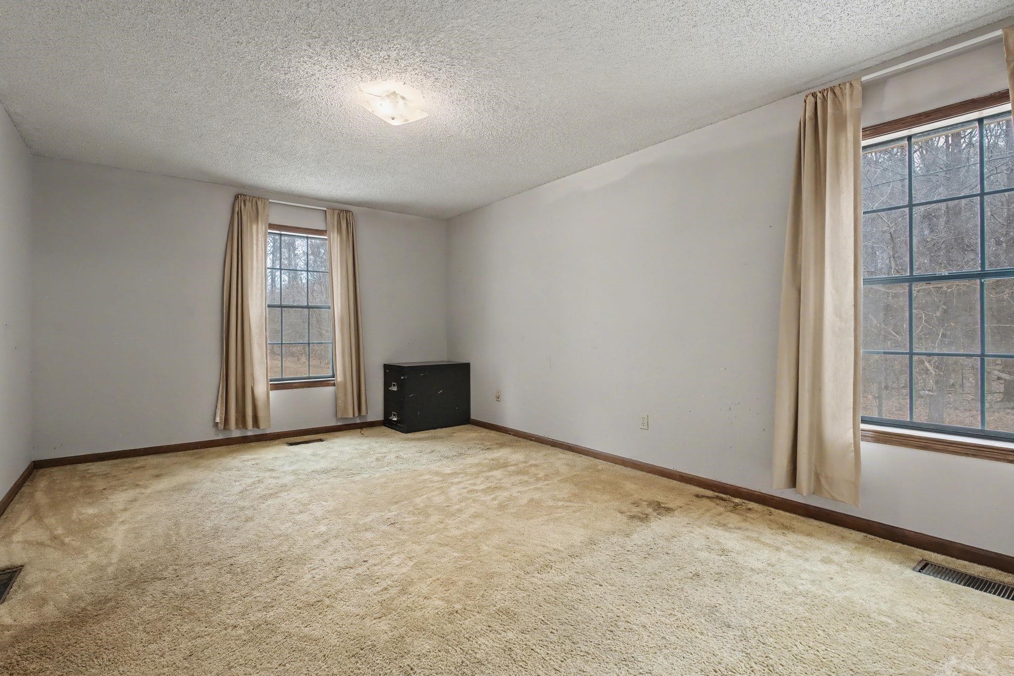 7439 Lexie Gardner Road Bartlett, TN 38002 - Photo 14 of 40 an empty room with windows