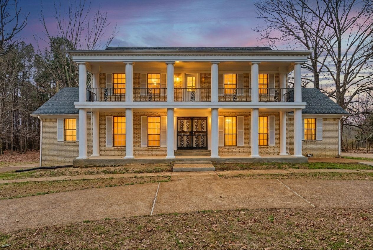 7439 Lexie Gardner Road Bartlett, TN 38002 - Photo 2 of 40 a front view of a house