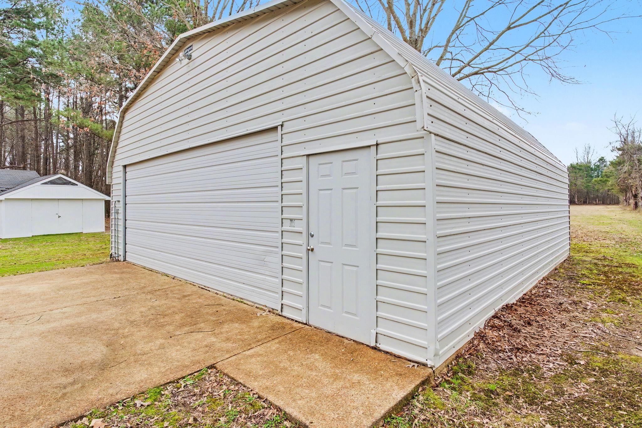 7439 Lexie Gardner Road Bartlett, TN 38002 - Photo 35 of 40 a view of backyard of house
