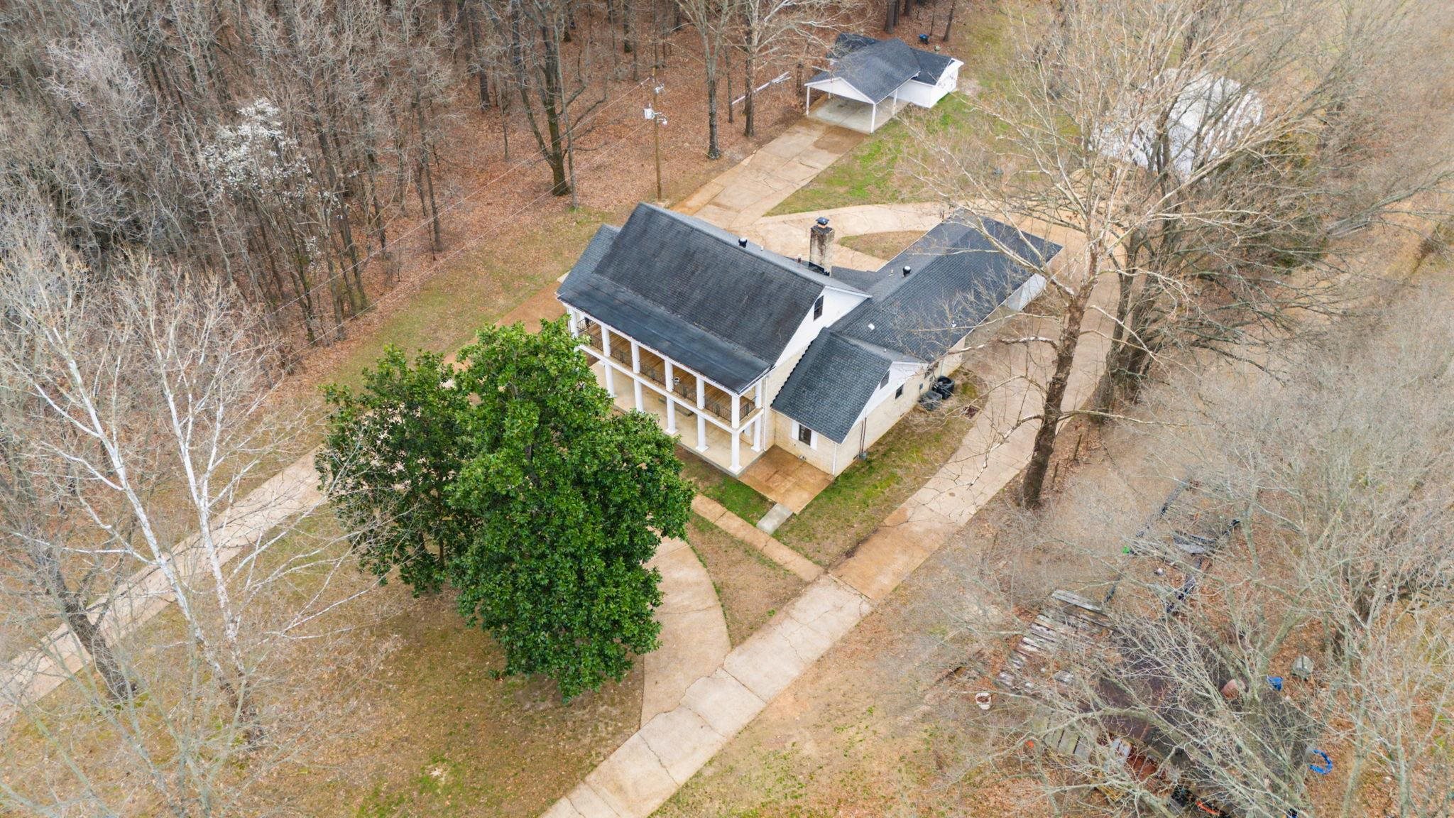 7439 Lexie Gardner Road Bartlett, TN 38002 - Photo 38 of 40 a view of a small yard with plants